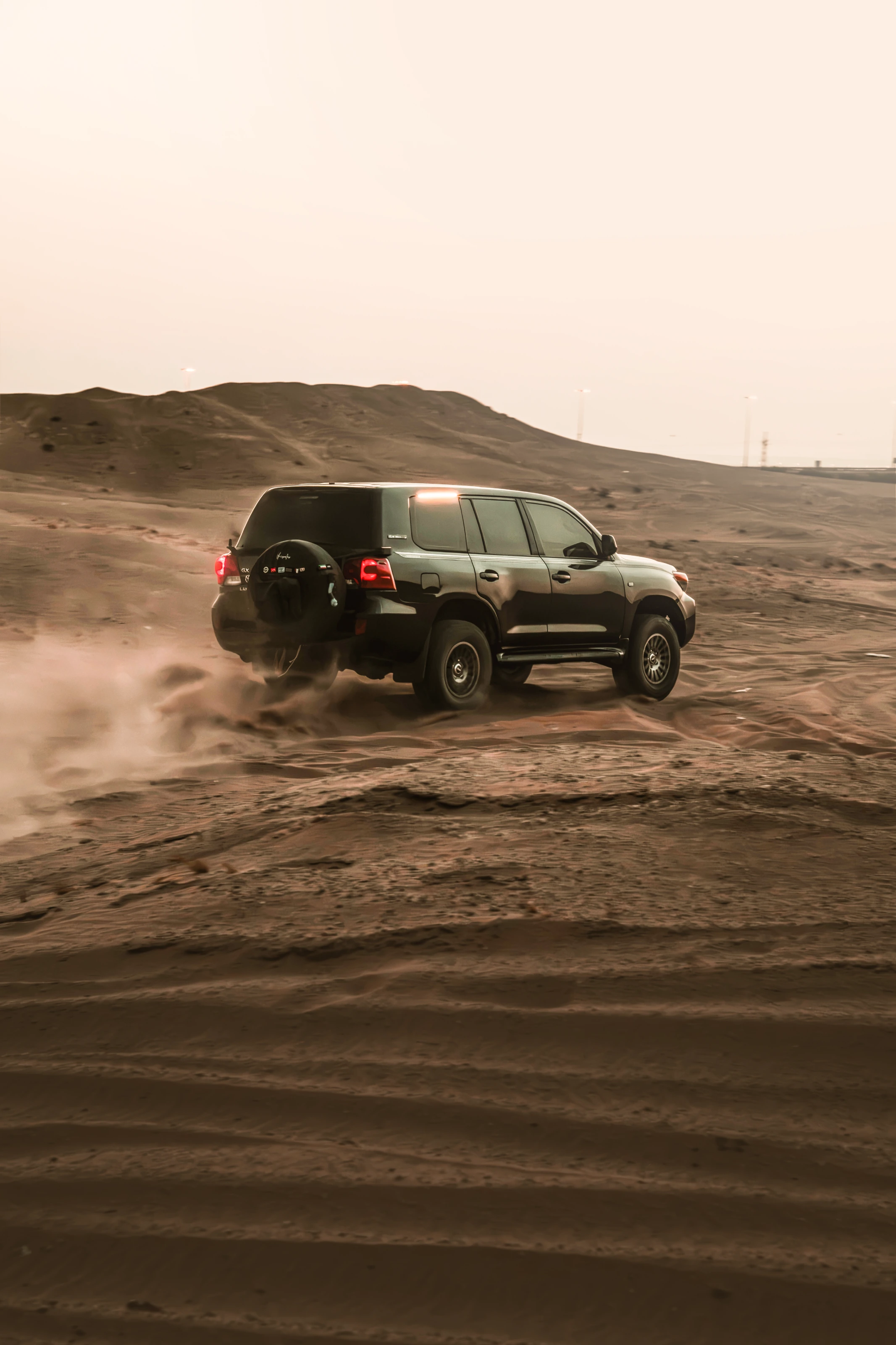 Toyota driving through the desert